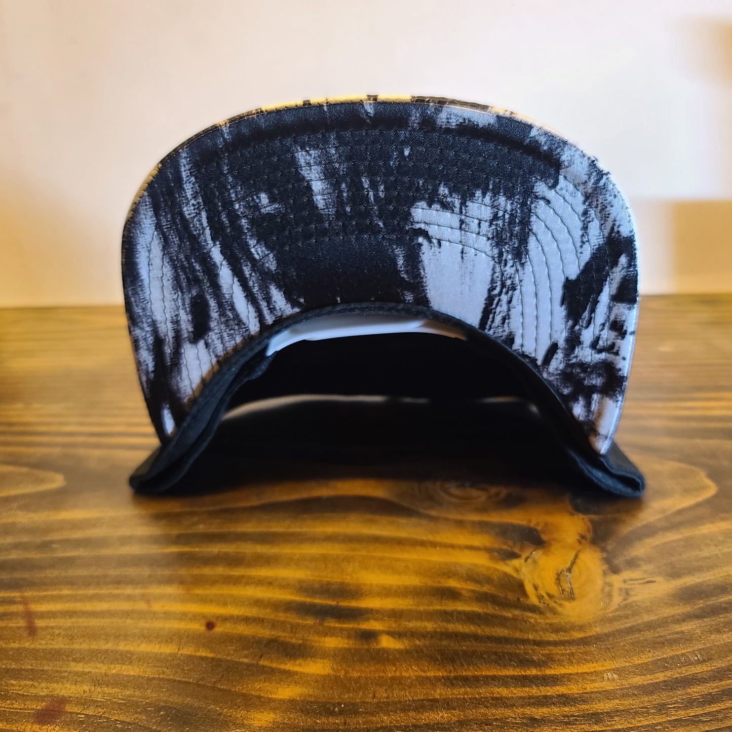 FeatureCard Hat black white paint splash Snap back